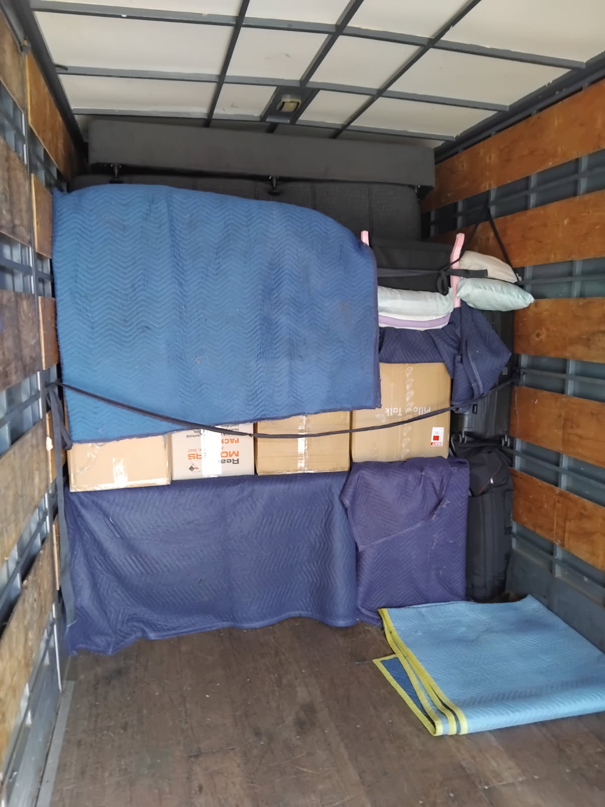 Removalist carefully handling items